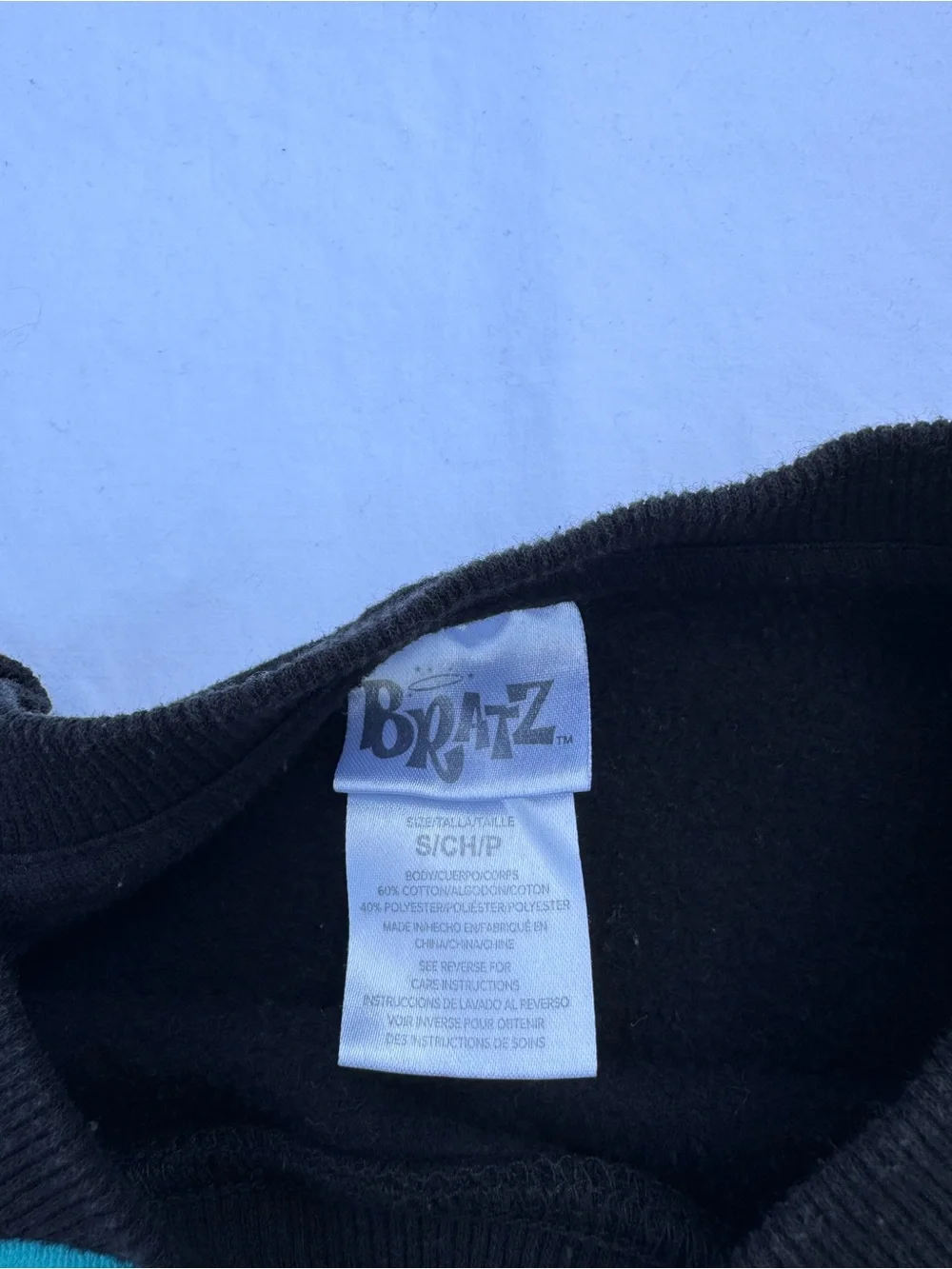 Bratz Women's Black Graphic Crewneck Sweater - Pink World Tour Design
